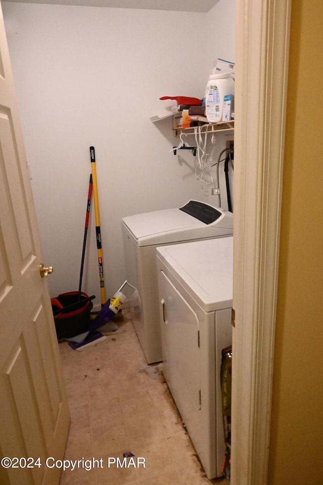 laundry area featuring laundry area and washing machine and dryer