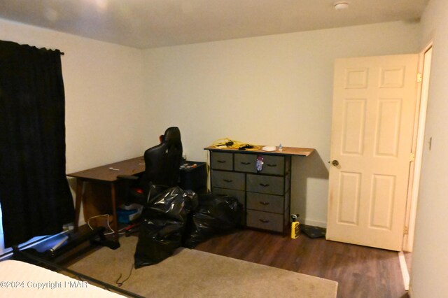 home office with dark wood finished floors