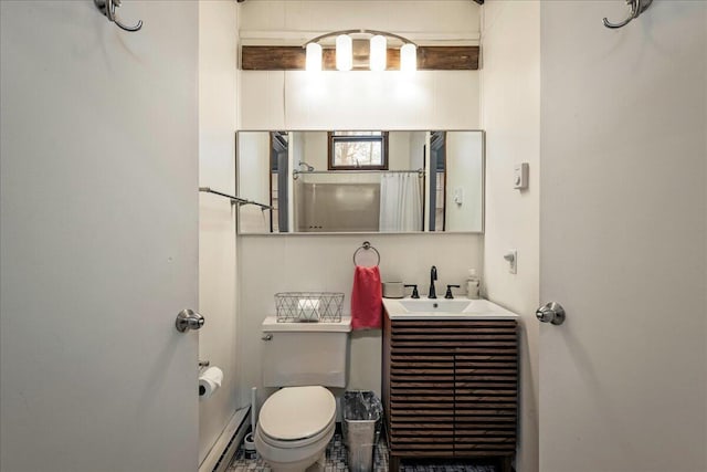 73 Big Bass Dr, Gouldsboro, PA 18424 - full bathroom featuring a baseboard radiator, toilet, vanity, and a shower with shower curtain