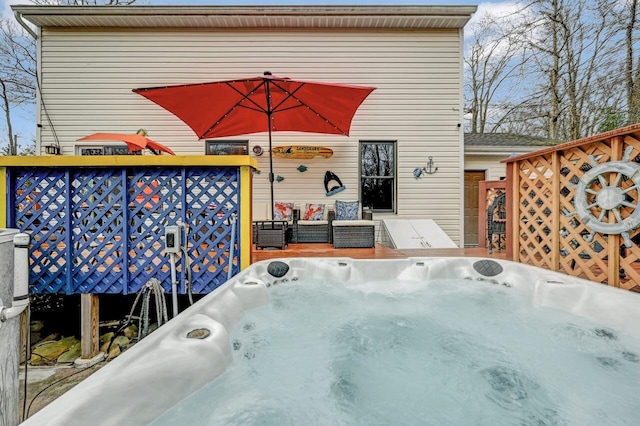 exterior space with a hot tub