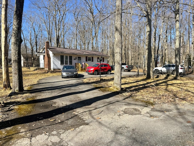 view of front of home with a chimney