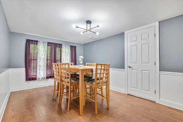 3405 Masons Ln, East Stroudsburg, PA 18302 - dining area featuring a chandelier and light wood-style flooring