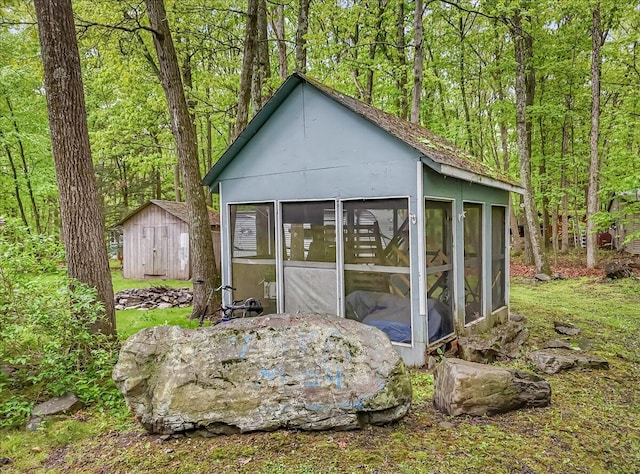 3405 Masons Ln, East Stroudsburg, PA 18302 - view of shed featuring a sunroom and a forest view