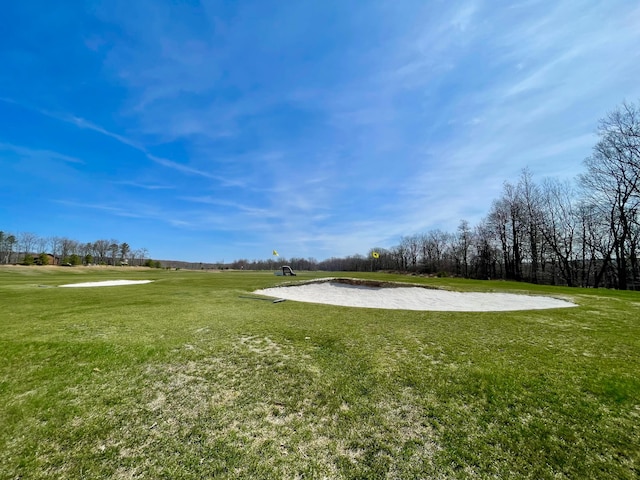 surrounding community with a lawn