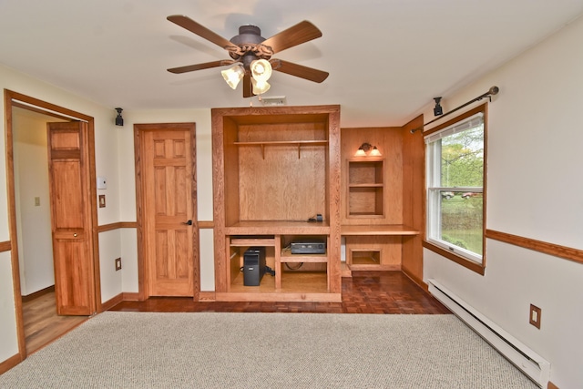 bedroom with baseboard heating and baseboards