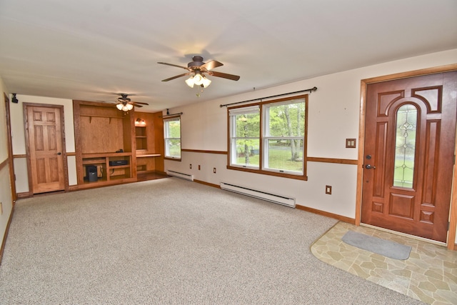 entryway with a baseboard heating unit, light carpet, a ceiling fan, and baseboards