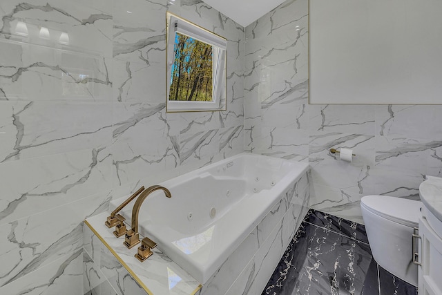 23 Primrose Dr, East Stroudsburg, PA 18302 - full bathroom with a jetted tub, marble finish floor, toilet, and tile walls