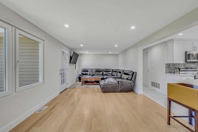 23 Primrose Dr, East Stroudsburg, PA 18302 - living area with recessed lighting, light wood-style flooring, and visible vents