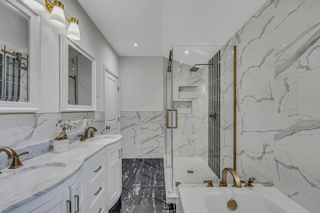 23 Primrose Dr, East Stroudsburg, PA 18302 - full bathroom featuring a tub to relax in, a sink, a marble finish shower, and tile walls