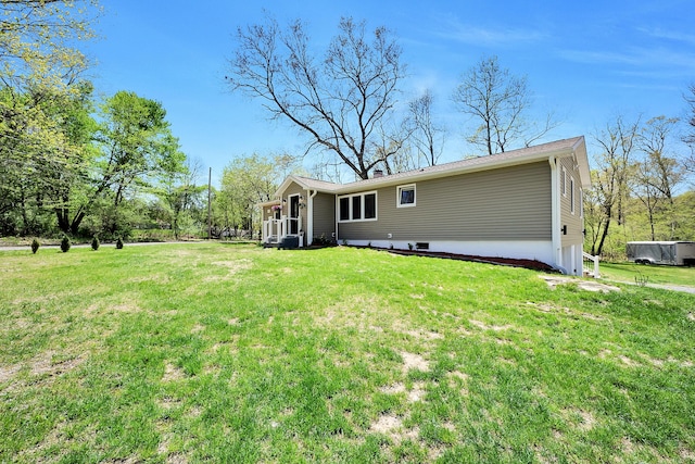 23 Primrose Dr, East Stroudsburg, PA 18302 - rear view of property with a lawn
