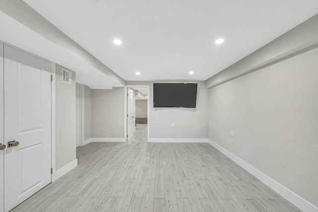 23 Primrose Dr, East Stroudsburg, PA 18302 - finished below grade area with baseboards, recessed lighting, light wood finished floors, and visible vents