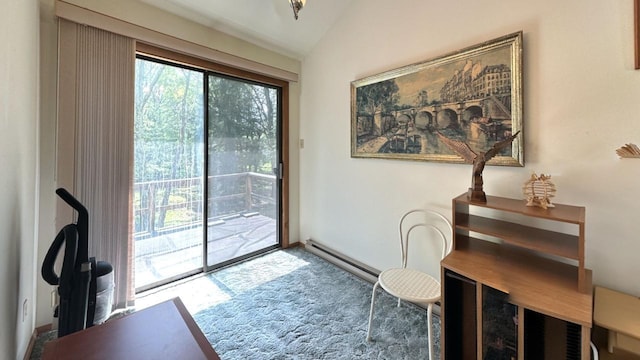 doorway featuring a baseboard heating unit, carpet floors, and lofted ceiling