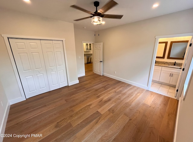 30 Susquehanna Dr, Jim Thorpe, PA 18229 - unfurnished bedroom featuring light wood-style floors, a closet, recessed lighting, ceiling fan, and ensuite bath