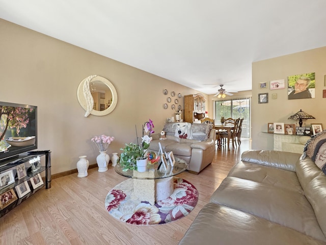 5119 Derby Rd, Tobyhanna, PA 18466 - living area featuring ceiling fan, light wood-type flooring, and baseboards