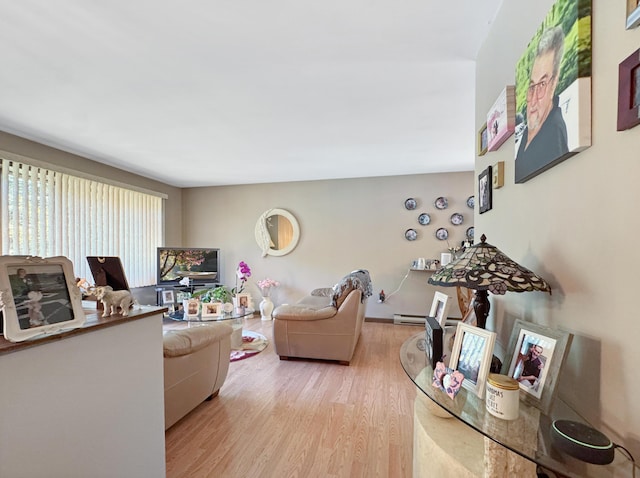 5119 Derby Rd, Tobyhanna, PA 18466 - living room with light wood-type flooring and a baseboard heating unit