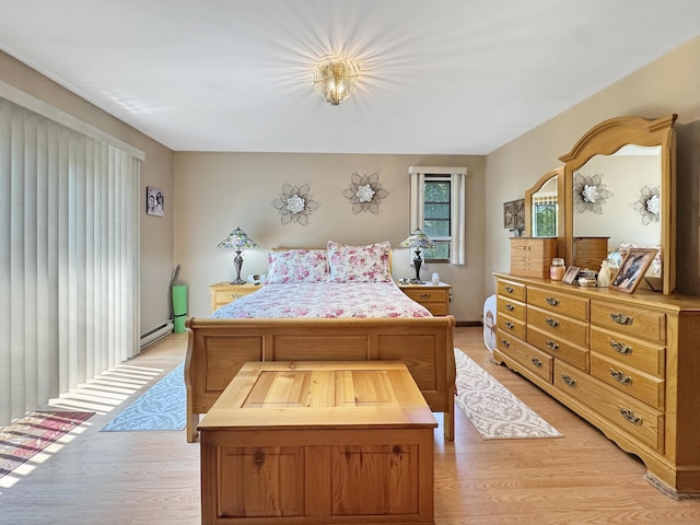 5119 Derby Rd, Tobyhanna, PA 18466 - bedroom with light wood finished floors and a baseboard radiator