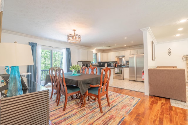 165 Stillwater Dr, Pocono Summit, PA 18346 - dining space with ornamental molding, light wood-type flooring, a chandelier, and recessed lighting