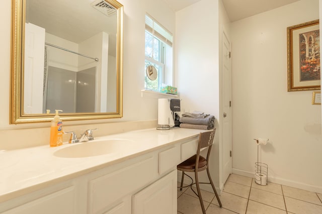 165 Stillwater Dr, Pocono Summit, PA 18346 - bathroom with vanity, tile patterned floors, a shower, and baseboards