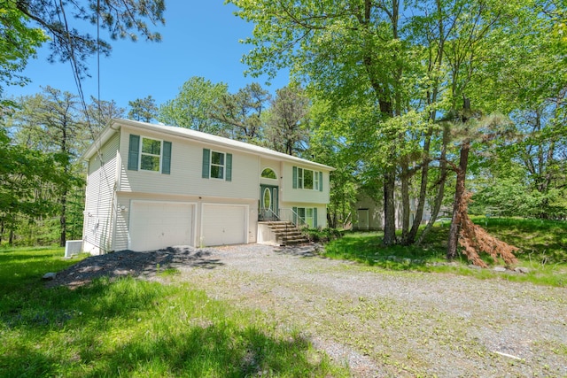 165 Stillwater Dr, Pocono Summit, PA 18346 - split foyer home with a garage and driveway