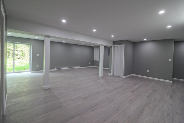 302 Leaf St, Tobyhanna, PA 18466 - below grade area featuring light wood-style flooring, recessed lighting, and a baseboard heating unit