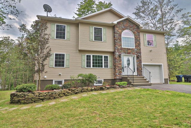 302 Leaf St, Tobyhanna, PA 18466 - view of front of property with a garage, a front yard, and driveway