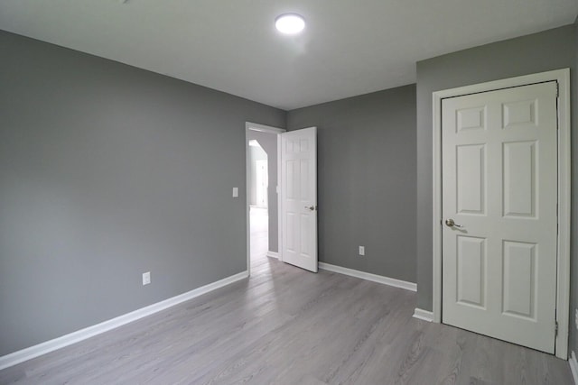 302 Leaf St, Tobyhanna, PA 18466 - unfurnished bedroom with light wood-type flooring and baseboards