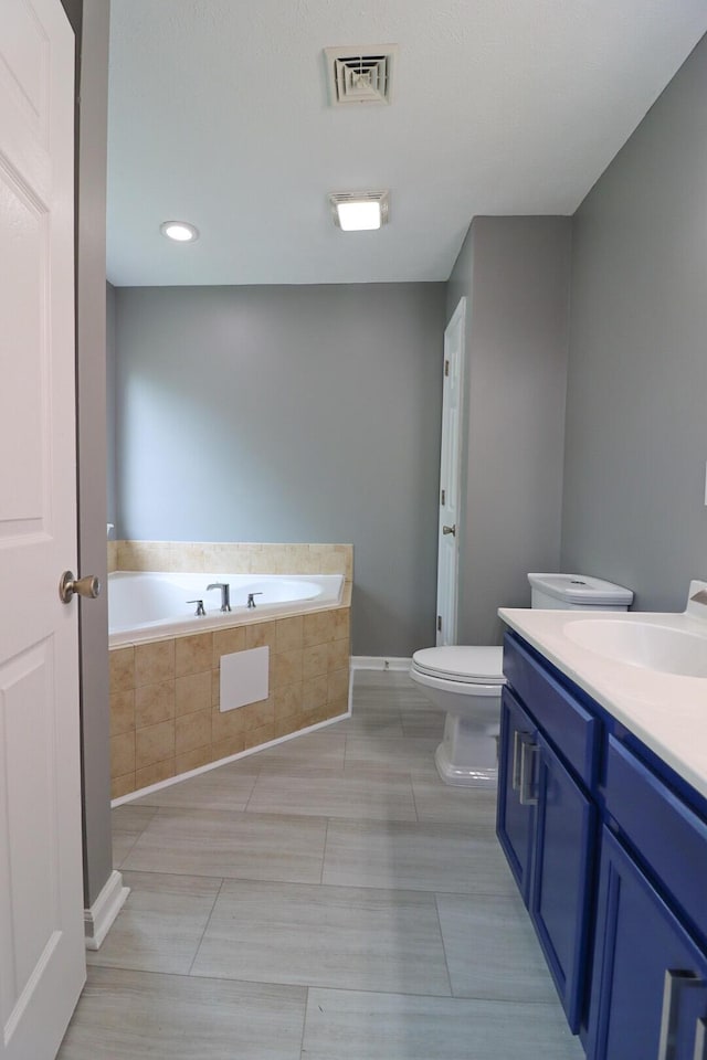302 Leaf St, Tobyhanna, PA 18466 - full bath featuring a garden tub, vanity, recessed lighting, and tile patterned floors