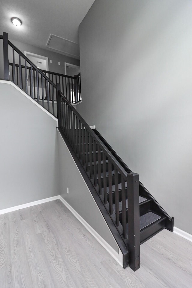 302 Leaf St, Tobyhanna, PA 18466 - stairs featuring wood finished floors and attic access
