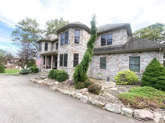 5132 Pocono Park Ln, Swiftwater, PA 18370 - view of front of house with stone siding