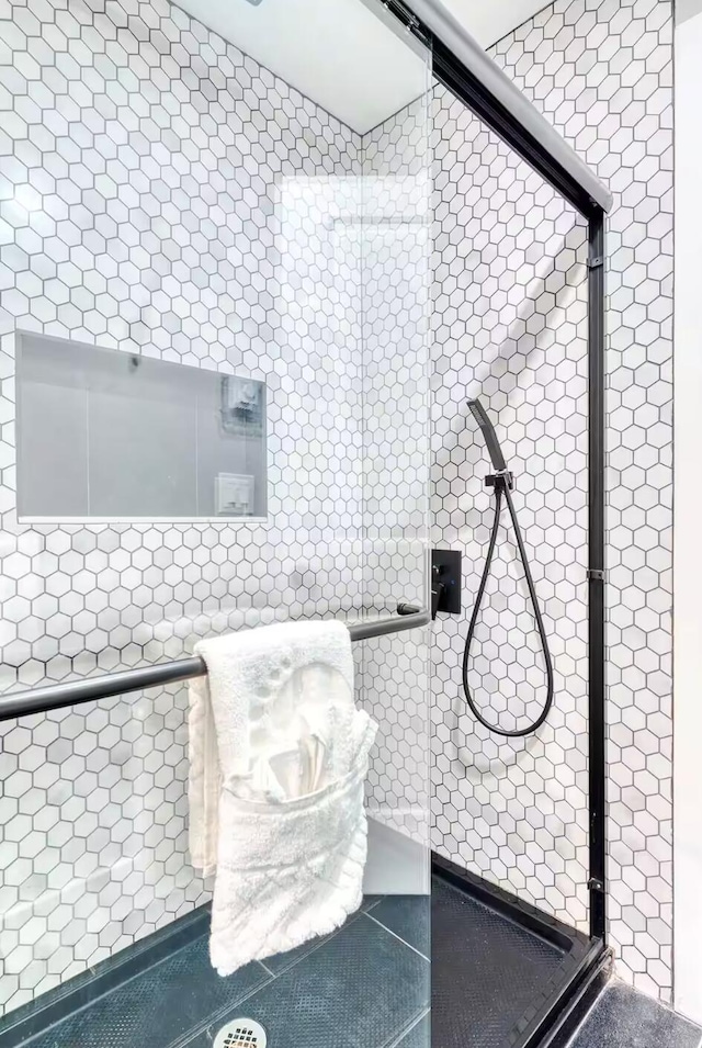 3312 Black Cherry Ct, Long Pond, PA 18334 - bathroom featuring a stall shower