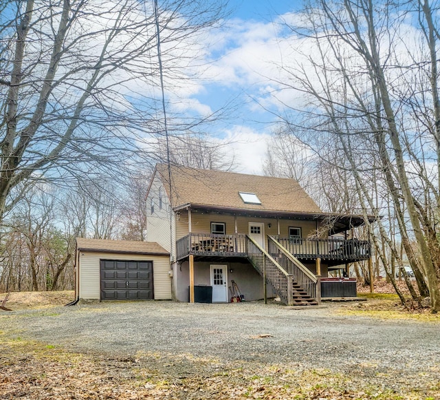 3312 Black Cherry Ct, Long Pond, PA 18334 - rustic home featuring an outdoor structure, driveway, stairway, a wooden deck, and a shingled roof
