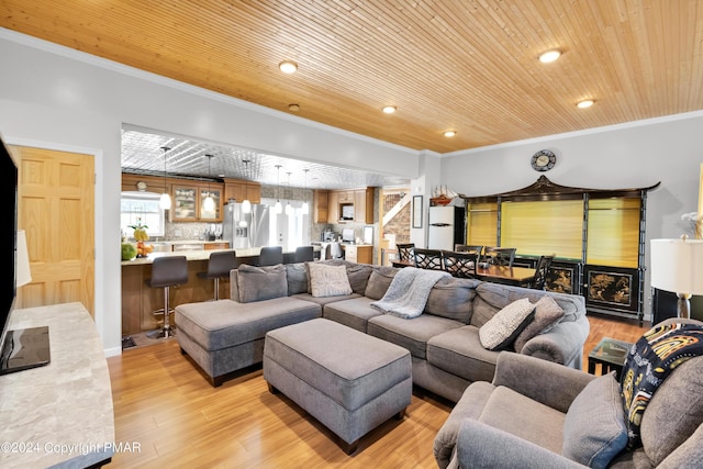 living room featuring ornamental molding, recessed lighting, wood ceiling, and light wood-style floors