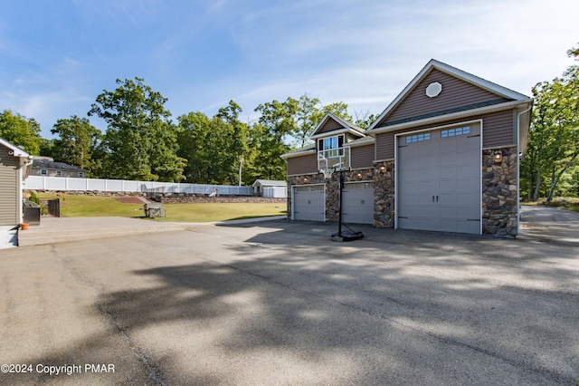 garage with fence