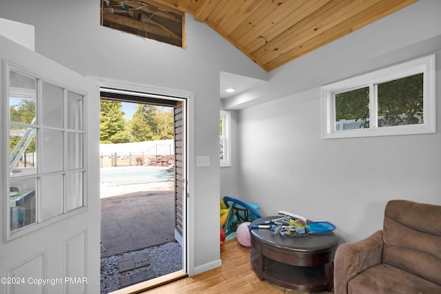 interior space featuring high vaulted ceiling, wooden ceiling, recessed lighting, wood finished floors, and baseboards