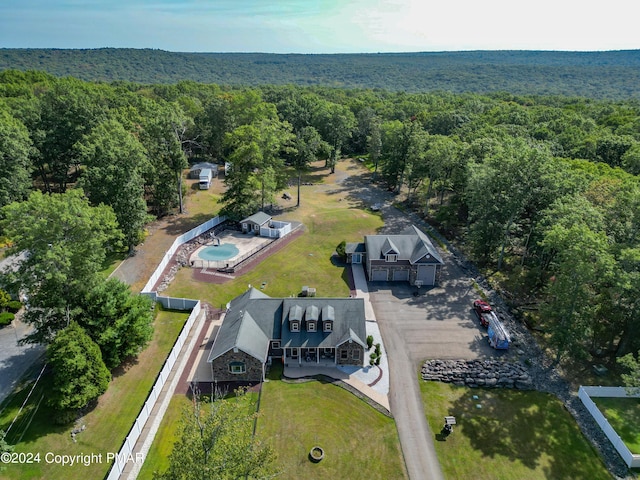 bird's eye view featuring a view of trees