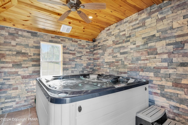 interior space with wood ceiling, visible vents, and a hot tub