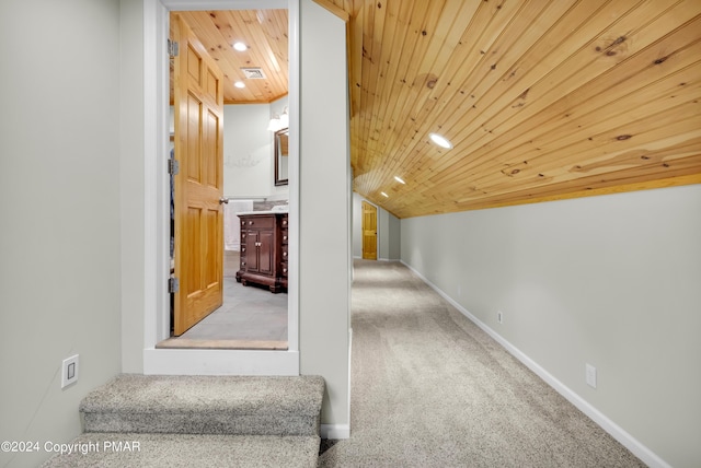 hall with baseboards, wood ceiling, carpet, vaulted ceiling, and recessed lighting