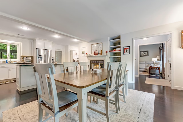106 Legends Ct, East Stroudsburg, PA 18302 - dining room featuring a tile fireplace, recessed lighting, and dark wood finished floors
