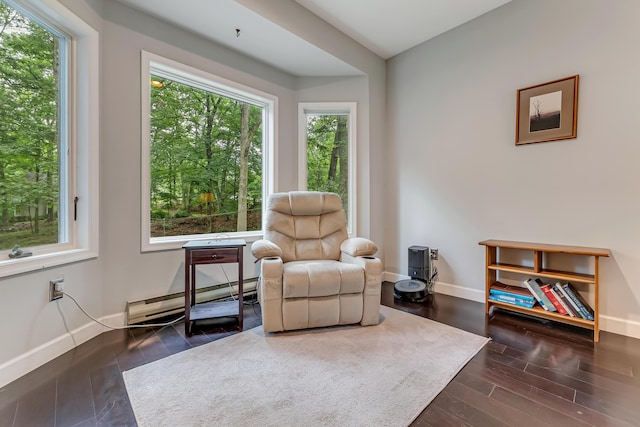 106 Legends Ct, East Stroudsburg, PA 18302 - living area with a baseboard heating unit and wood finished floors