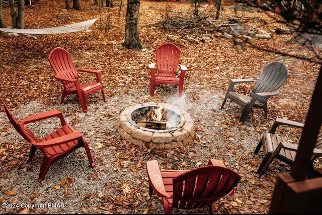 view of patio with an outdoor fire pit