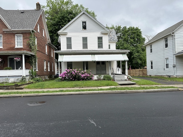 846 Thomas St, Stroudsburg, PA 18360 - view of front of property featuring covered porch and a front lawn