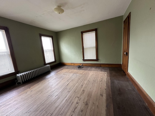 846 Thomas St, Stroudsburg, PA 18360 - unfurnished room with radiator, hardwood / wood-style floors, and baseboards