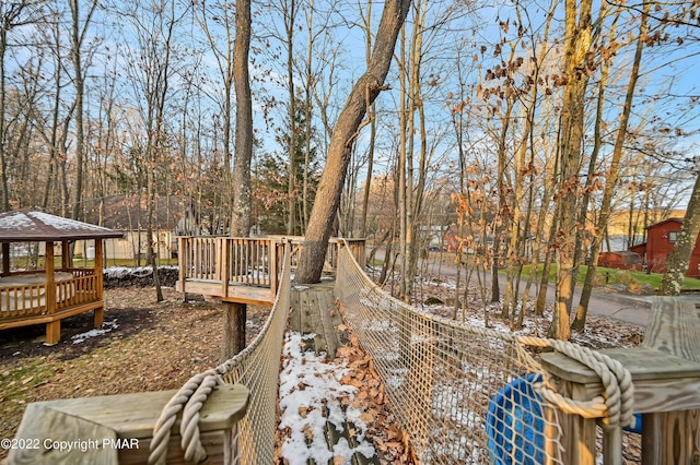 view of yard with a deck and a gazebo