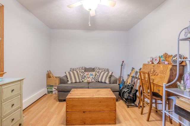 113 Larsen Ln, Cresco, PA 18326 - interior space featuring light wood-style floors, a baseboard heating unit, and a ceiling fan