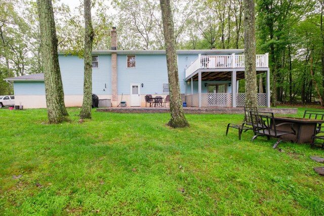 113 Larsen Ln, Cresco, PA 18326 - back of house with a yard and a chimney
