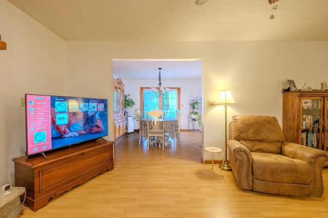 113 Larsen Ln, Cresco, PA 18326 - living room featuring light wood-type flooring and a chandelier
