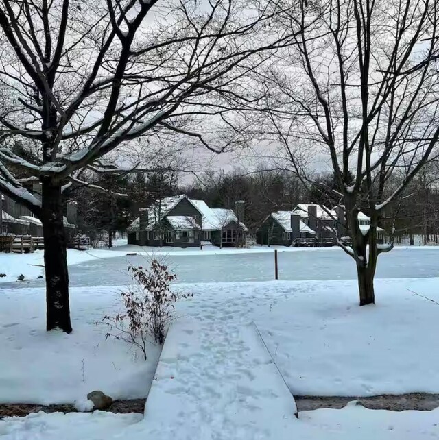 216 Snow Ridge Cir, Lake Harmony, PA 18624 - yard layered in snow featuring a residential view