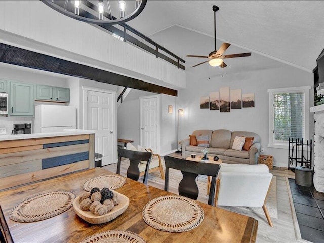 216 Snow Ridge Cir, Lake Harmony, PA 18624 - dining area with ceiling fan, lofted ceiling, light wood-style floors, and baseboards