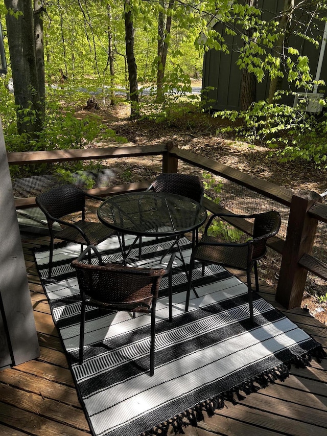 216 Snow Ridge Cir, Lake Harmony, PA 18624 - wooden terrace featuring outdoor dining area