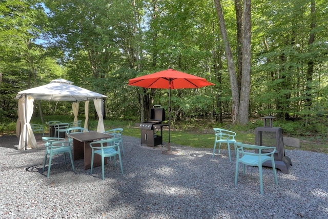 view of yard featuring a patio area and a gazebo